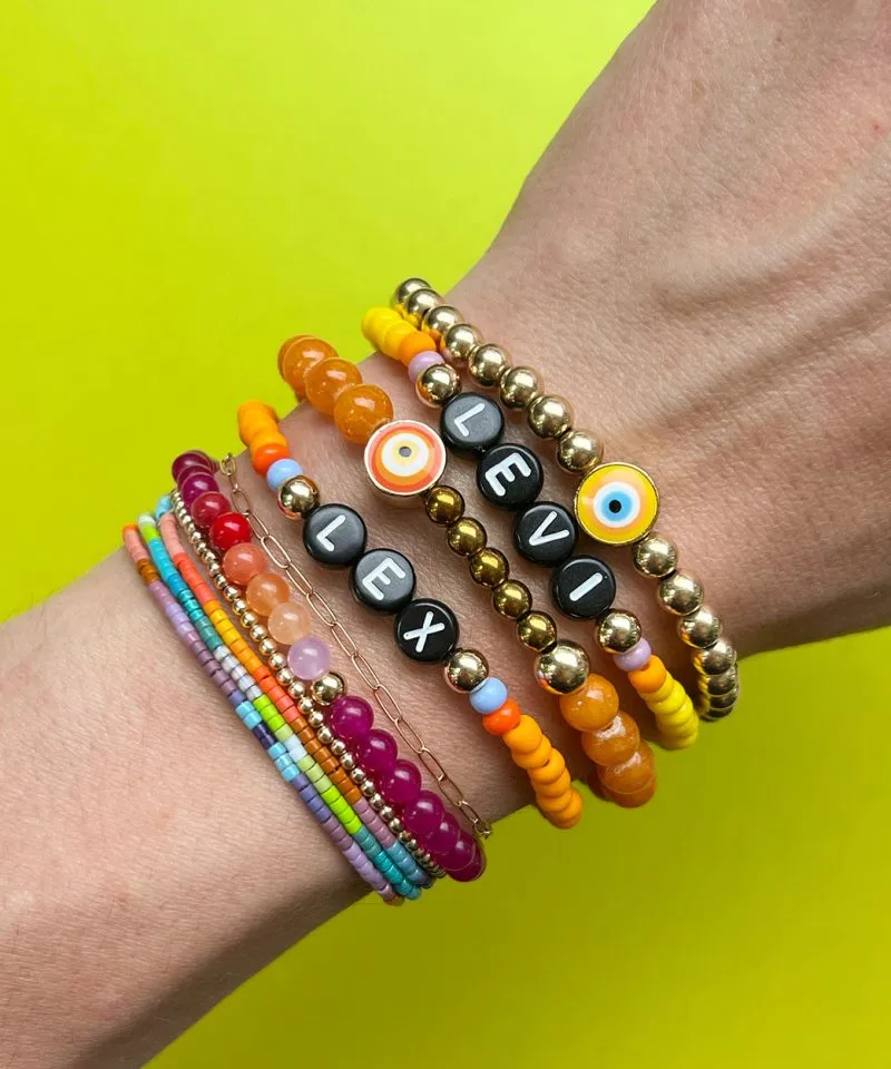 Name Game Bracelet – Frosted Orange & Yellow Evil Eye