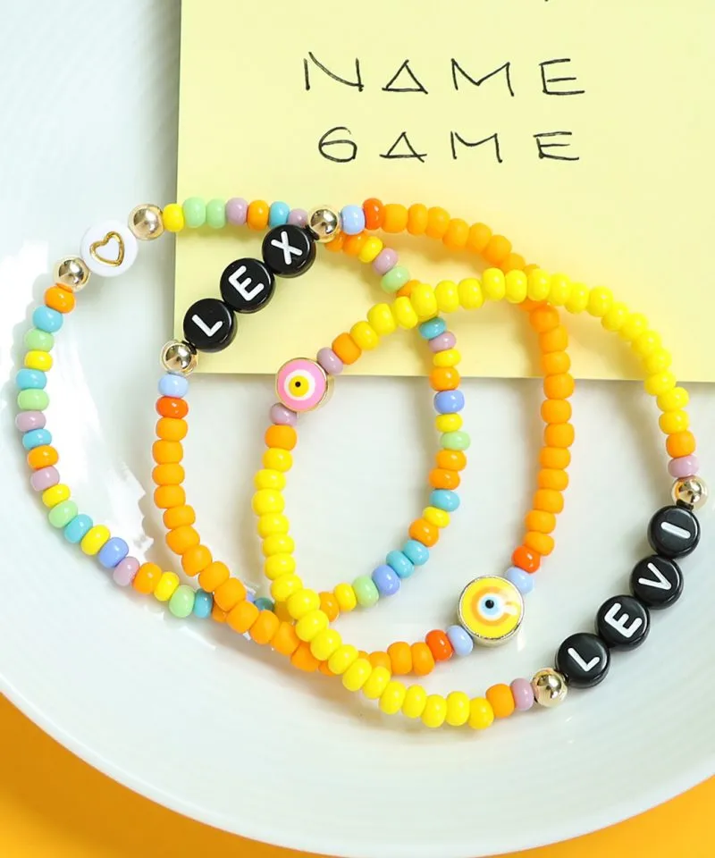 Name Game Bracelet – Yellow & Pink Evil Eye